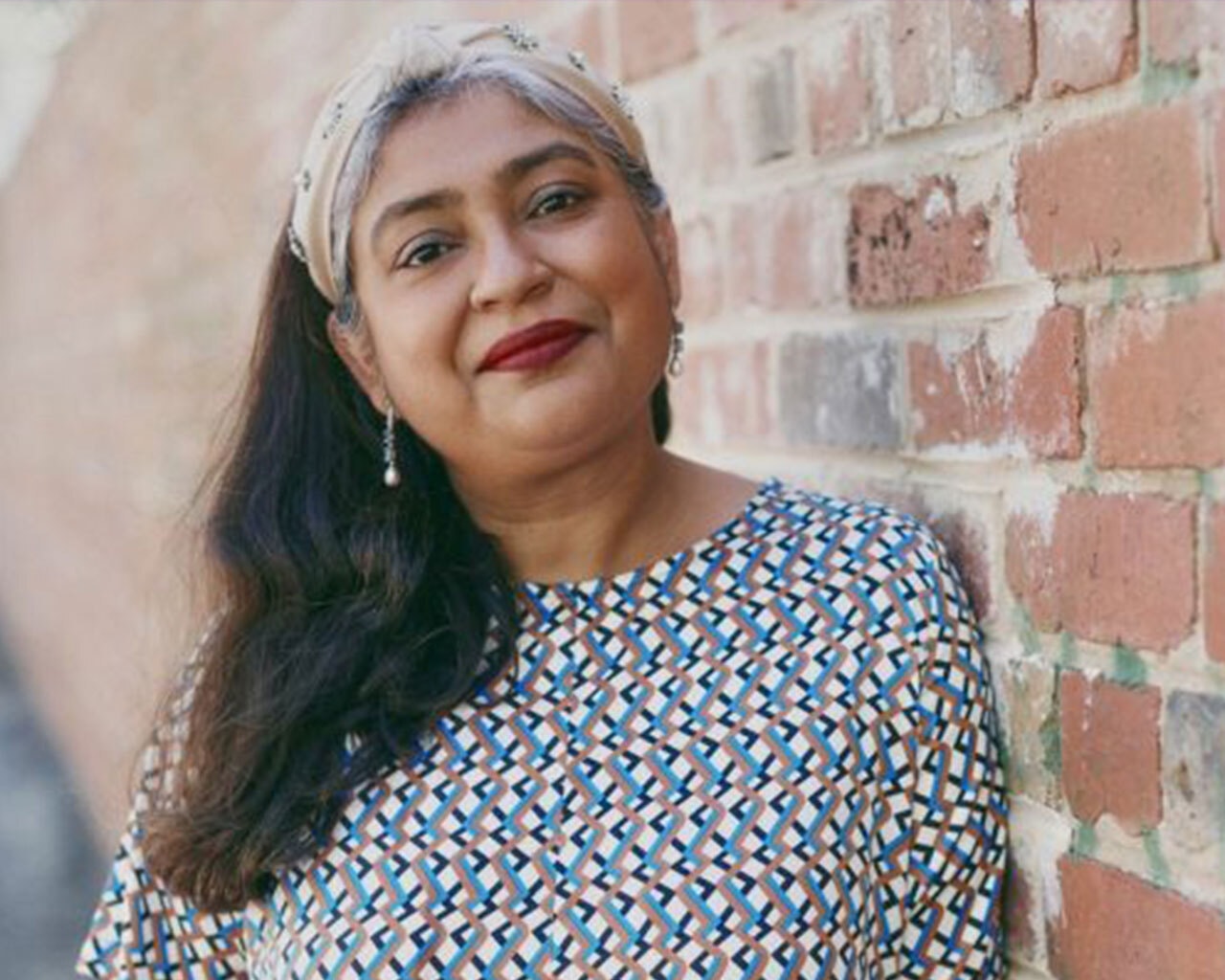 Dr Trish Mitra‑Kahn