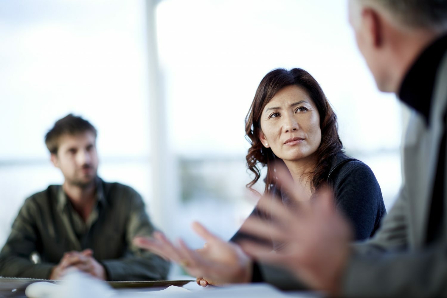 PiA woman at work boardroom discussion