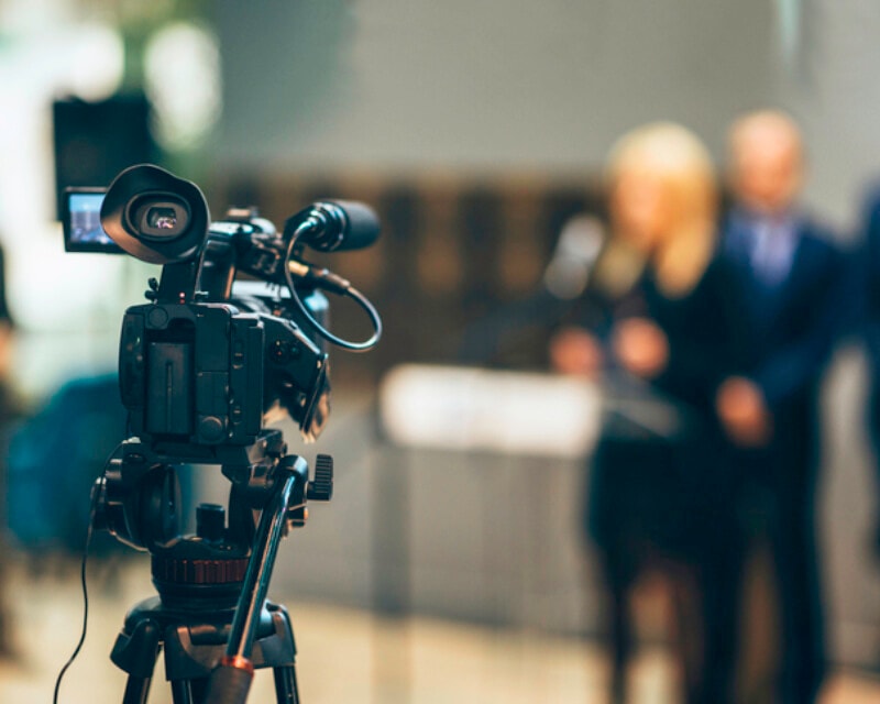 Media camera at publicity event.