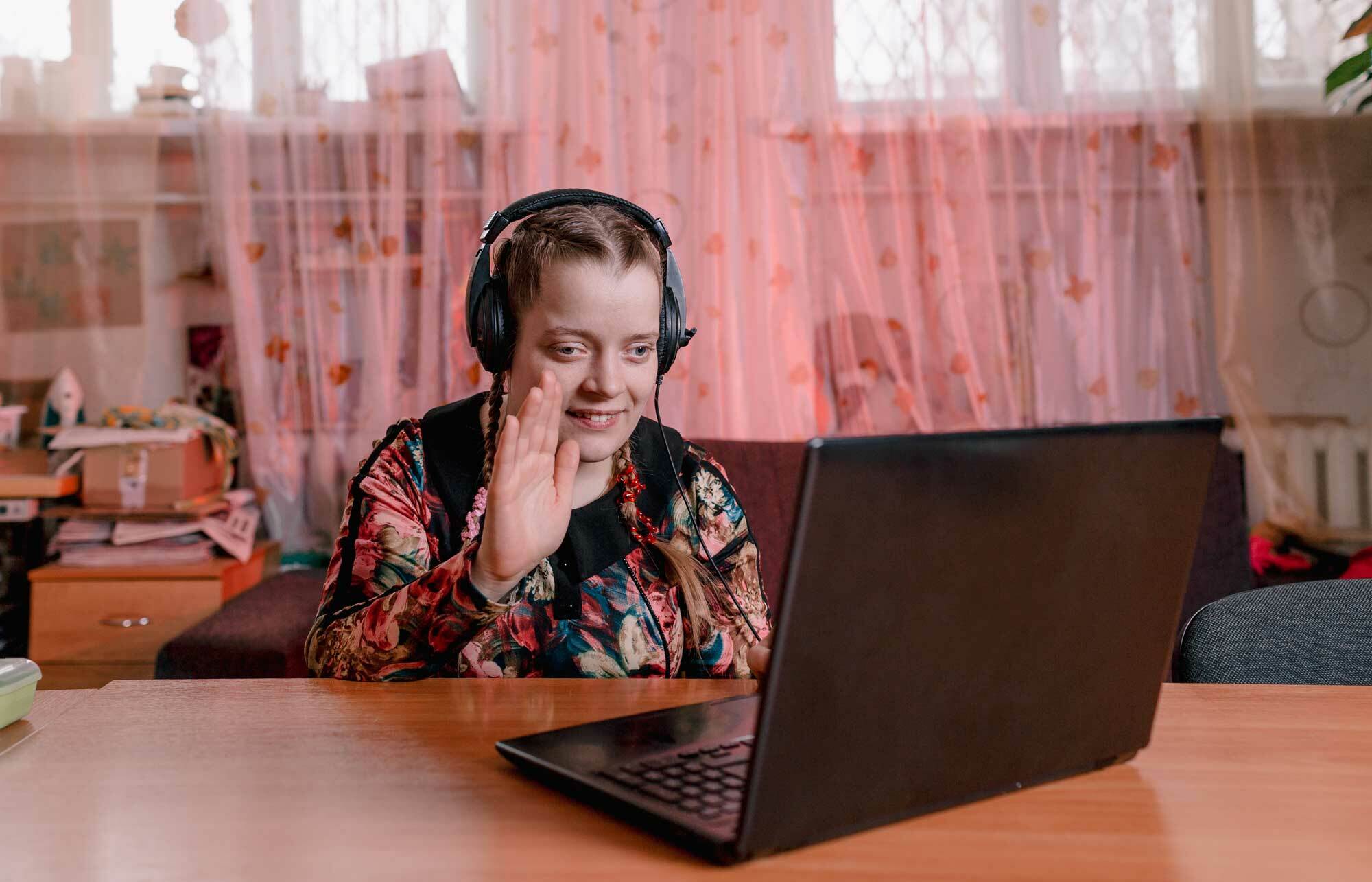 I Stock 1312345504 s young person with disability on a video meeting